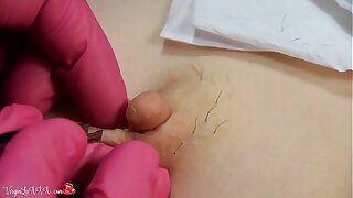 Man Beautician Plucks Horripilate on Nipples of Girl on Depilation and Massaging Tits In Red Latex Gloves
